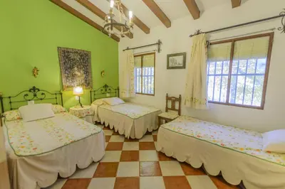 Cama o camas de una habitación en El Molino de las Palomas
