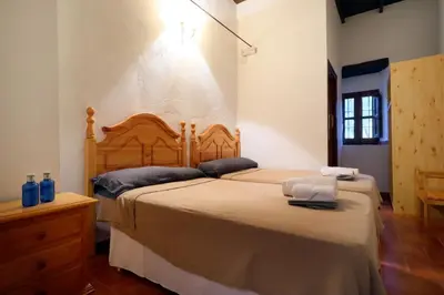 Cama o camas de una habitación en Casa Rural COMPLETA Finca Los Conventos en Adamuz; Córdoba