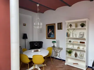 Una televisión o centro de entretenimiento en Casa Boutique Eros