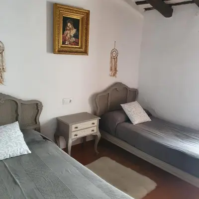 Cama o camas de una habitación en Casa Rural San Antonio