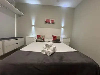 Cama o camas de una habitación en Garden City lofts