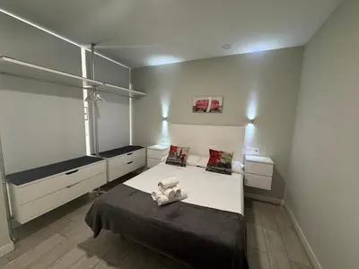 Cama o camas de una habitación en Garden City lofts
