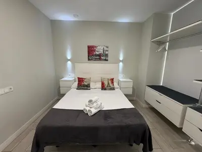 Cama o camas de una habitación en Garden City lofts