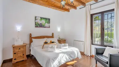 Cama o camas de una habitación en Iratxe Montefrío by Ruralidays