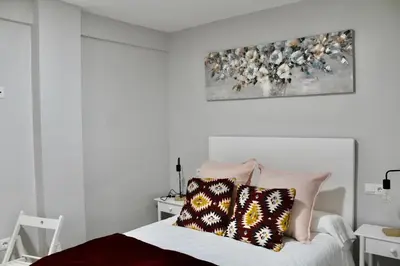 Cama o camas de una habitación en WISH SUITE BASILICA