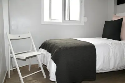 Cama o camas de una habitación en WISH SUITE BASILICA