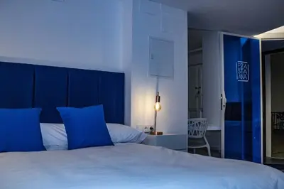 Cama o camas de una habitación en Casa Rural Plaza Santa Ana