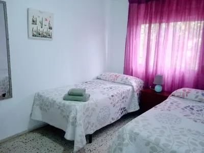 Cama o camas de una habitación en Casa Violeta