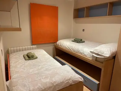 Cama o camas de una habitación en Bernabé Soriano 2