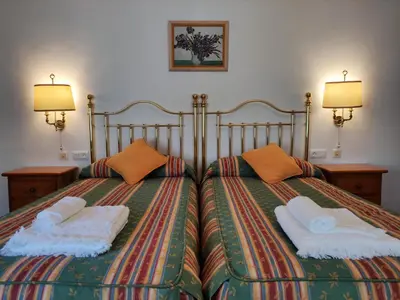Cama o camas de una habitación en Entretorres. Casa-dúplex en centro histórico.