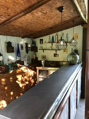 El salón o zona de bar de Casa Rural La ilusion