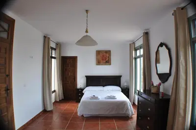 Cama o camas de una habitación en Cortijo la amazona