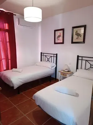 Cama o camas de una habitación en Cortijo la amazona