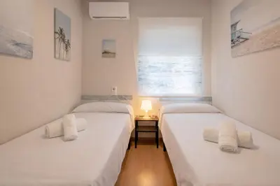 Cama o camas de una habitación en Apartamento CONDE DE PRIEGO