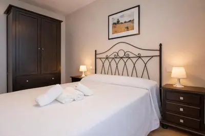 Cama o camas de una habitación en Apartamento CONDE DE PRIEGO