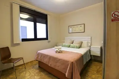 Cama o camas de una habitación en Amplio y Moderno Apartamento Lorenzo Ferreira