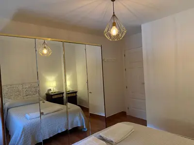 Cama o camas de una habitación en Apartamento en Luis Montoto, Nervión. Céntrico