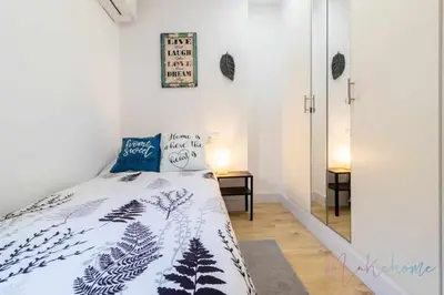 Cama o camas de una habitación en Apartamento 2 en Estadio Sevilla, 6 plazas y metro