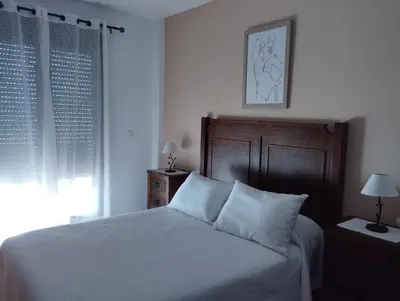 Cama o camas de una habitación en Apartamento turístico Rutas del Torcal