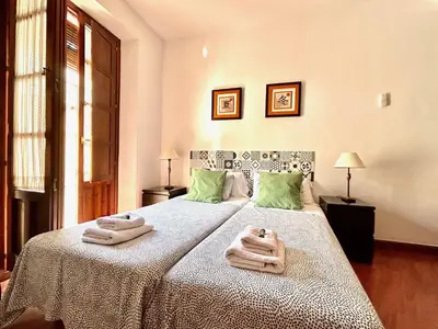 Cama o camas de una habitación en Hispalis San Julian