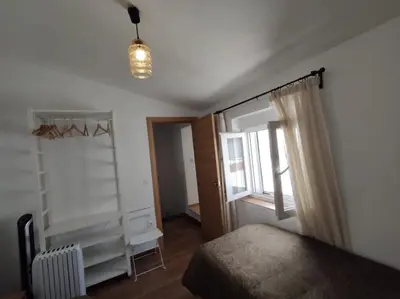 Cama o camas de una habitación en Casa Cerro Luna Con Chimenea