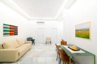 Zona de estar de Arco Macarena Lofts by SHS