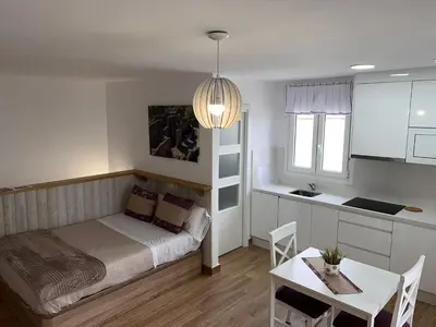 Cama o camas de una habitación en APARTAMENTO , LOFT BOBASTRO CErCA DEL CAMINITO DEL REY ARDALES