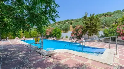 Piscina en o cerca de Cortijo La Mimbre Priego de Córdoba by Ruralidays