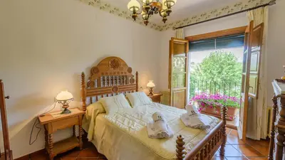 Cama o camas de una habitación en Cortijo La Mimbre Priego de Córdoba by Ruralidays