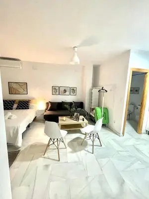 Cama o camas de una habitación en Bj. A Apartamentos Arguiñan