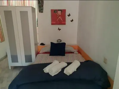 Cama o camas de una habitación en Apartamento tipo loth Alameda