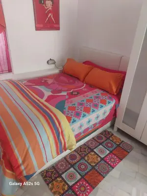 Cama o camas de una habitación en Apartamento tipo loth Alameda