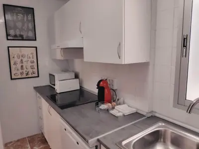 Una cocina o zona de cocina en Victoria Home Córdoba