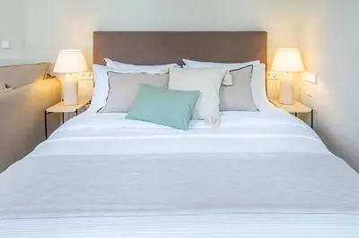 Cama o camas de una habitación en Cordoba Home Center Suites