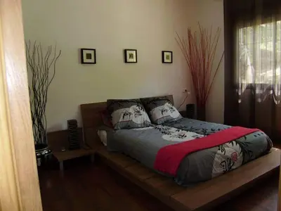 Cama o camas de una habitación en Casa con encanto frente al lago