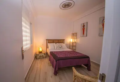 Cama o camas de una habitación en Luminoso piso junto al Mercado de Feria