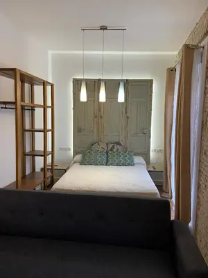 Cama o camas de una habitación en CASA NAIA Santa Rufina 7