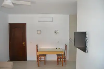 Una televisión o centro de entretenimiento en Apartamento en Olvera
