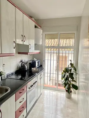 Una cocina o zona de cocina en Apartamento Centro Peña de los Enamorados