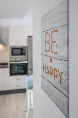 Una cocina o zona de cocina en Family HOME SUITS Encantos de Sevilla