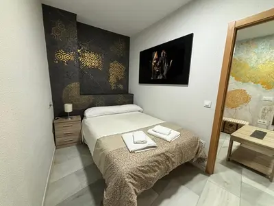 Cama o camas de una habitación en Apartamento céntrico en Plaza San Miguel