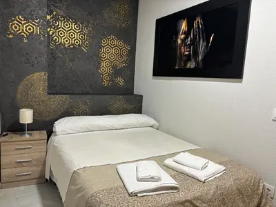 Cama o camas de una habitación en Apartamento céntrico en Plaza San Miguel