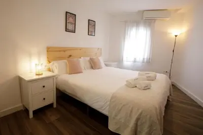Cama o camas de una habitación en Apartamentos El balcón de la Trinidad Córdoba - GREAT LOCATION