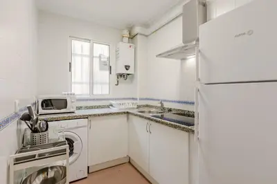 Una cocina o zona de cocina en AvantiStays La Judería, vive Sevilla con los cinco sentidos