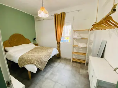 Cama o camas de una habitación en Apartamento San Eloy con Patio Privado