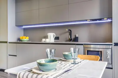 Una cocina o zona de cocina en Precioso Ático de diseño, gran Terraza de 35 m2 y de 16 m2 y Garaje en pleno Centro