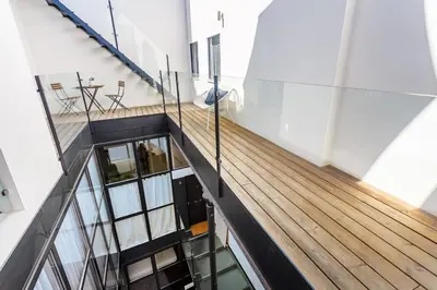 Plano de Precioso Ático de diseño, gran Terraza de 35 m2 y de 16 m2 y Garaje en pleno Centro