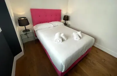 Cama o camas de una habitación en Ritual Alameda Suites