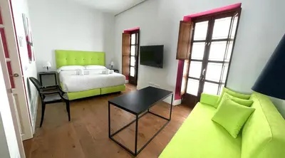 Cama o camas de una habitación en Ritual Alameda Suites