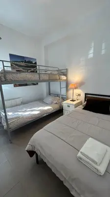 Cama o camas de una habitación en Casa Rural Nacimiento del Huéznar - Tomillo 23